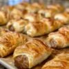 Golden, flaky sausage rolls filled with savory breakfast sausage, baked until beautifully puffed and crisp with rich buttery layers and a deliciously browned crust.